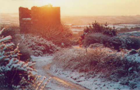 Tredinnick Stack at sunrise in the snow
